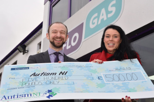 l/r Paul Ruegg (left) marketing executive, Flogas NI, presented a £500 cheque to Sarah Jane Cassells of Autism NI.