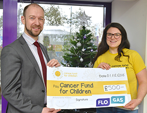 Paul Ruegg, senior marketing executive, Flogas NI, presented a £500 cheque to Sorcha Mac Laimhin corporate fundraiser for Cancer Fund for Children at their offices in Belfast.