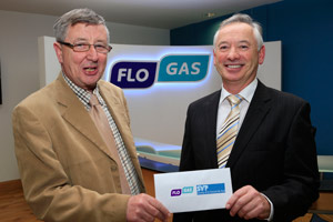 Tom Wall of Flogas Ireland (on left) presenting a €500 cheque to Joe Sweeney, area president of SVP Drogheda, at the Flogas customer support office in Knockbrack House on Mon 25 November.