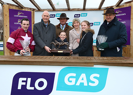John Rooney, managing director, Flogas Ireland (2nd from left) presents the winning Flogas Novice Chase trophy to some delighted younger members of the O’Leary family of Gigginstown Stud, owners of ‘Disko’.  Also pictured are (l/r) jockey Sean Flanagan, owner Edward O’Leary and trainer Noel Meade.