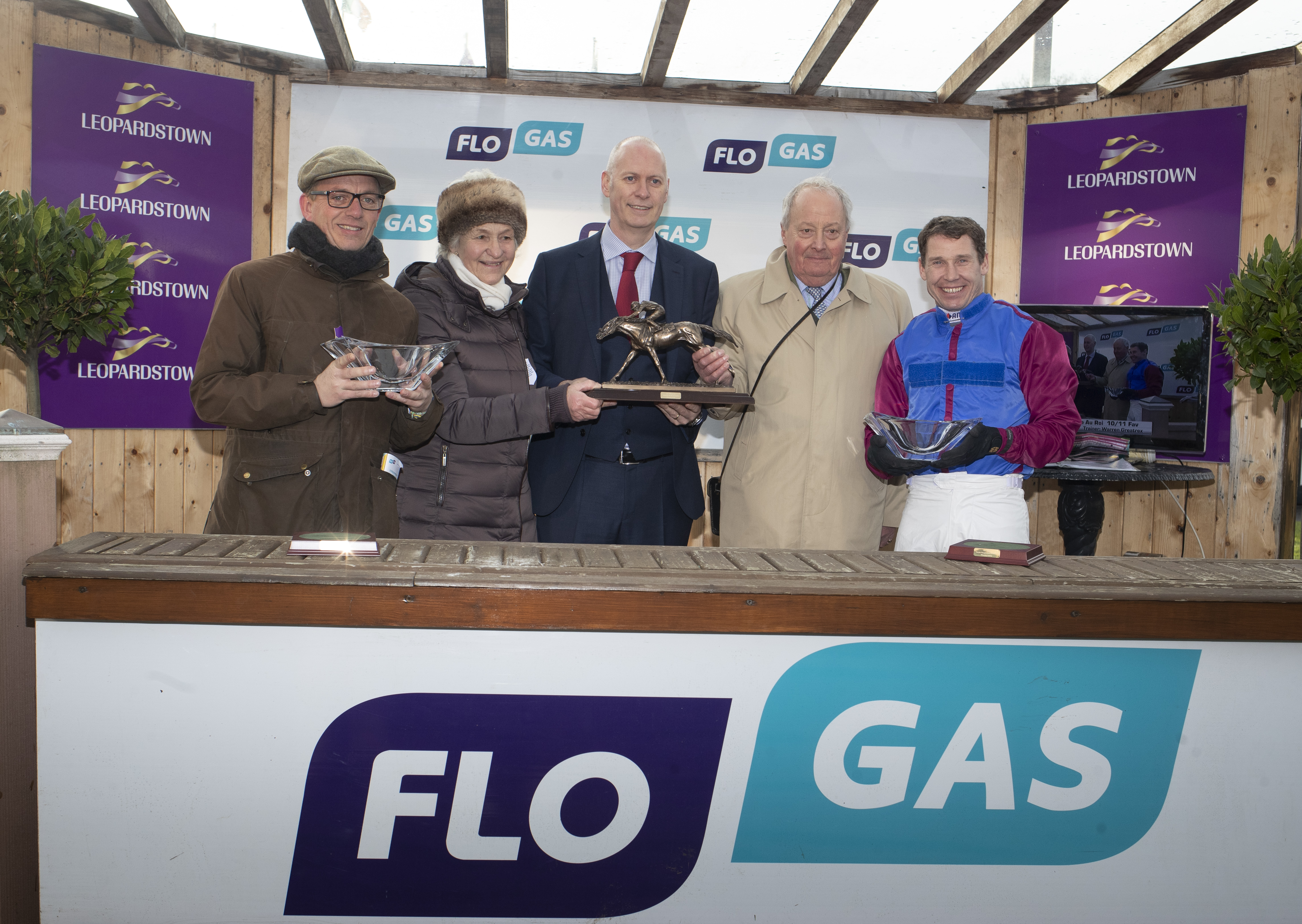 John Rooney(centre), managing director,  Flogas Ireland presents the trophies for the Grade 1 Flogas Novice Chase in the Dublin Racing Festival at Leopardstown to (l-r) trainer Warren Greatrix (Trainer), owners Nicky Turner and Andrew Merriam and jockey Richard Johnson OBE on Sunday 3rd February 2019