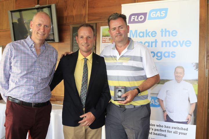 John Rooney, managing director of Flogas Ireland presents prizes to golf pro David Higgins of Waterville Golf Links and PJ Butler of Rednut Limited in Kilkenny, who were part of the winning team at the 2018 Flogas Pro-Am on 28th May.