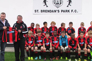 Brendan Martin (on left) of Flogas Heat Services Network, Padraig Killeen, manager of the U12s football team at St. Brendan’s Park FC in Tralee.