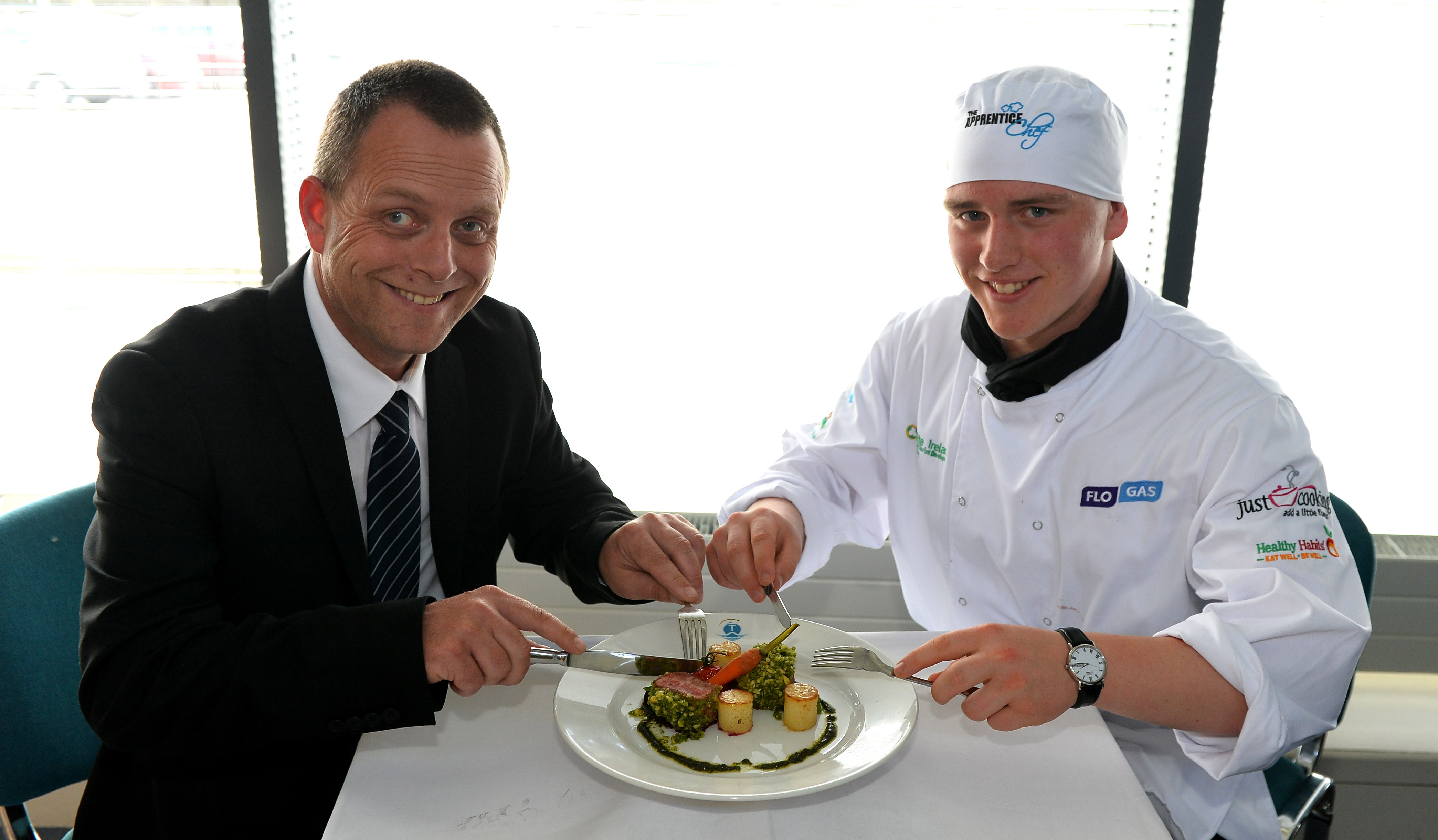 Supreme Apprentice Chef George Hennessy, shares his award winning roast loin of local lamb, red currant jus, fondant potato, beetroot, baby carrots and salsa verde with Flogas Ireland's Michael Murphy at the 2015/16 Apprentice Chef Finale, sponsored by Flogas and Failte Ireland, at the Institute of Technology Tralee on Friday 6 May.  The 16 year old from Dungourney is a student at Midleton College, Cork.