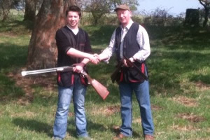 Image of Davy Benson, champion clay pigeon shooter, with Richard Martin, MD of Flogas Ireland