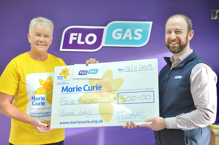 Marie Hannan, partnerships manager with Marie Curie, is presented with a £500 cheque by Paul Ruegg, senior marketing executive, Flogas.
