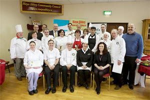 Caption: Michael Keogh, area representative for Flogas Ireland, (back row, 4th from left) with the delighted winners, judges and organisers of the 2014 Flogas Mayo Master Chef competition. 