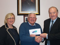 Pat Hegarty of Flogas Ireland (far right) presenting a €500 cheque to Brendan Dempsey, Cork area vice-president and Anne McKernan, member of the Cork SVP Fundraising Group on Thurs 22 November at the charity’s offices in Cork.