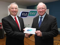 Tom Wall of Flogas Ireland (on left) presenting a €500 cheque to Michael Grogan, vice-president of SVP Drogheda, at the Flogas customer support office in Knockbrack House on Thurs 22 November.