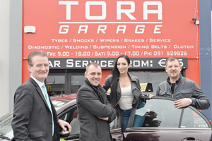 Caption: l/r Michael Gilmartin of Flogas Ireland, Raivis Dombrovskis of Tora Garage, model Shahira Barry and Toma Balaisis of Tora Garage at a photocall to celebrate Tora Garage’s two years in business and its successful on-site autogas conversion and filling centre.